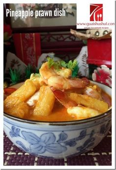 a bowl filled with food sitting on top of a table