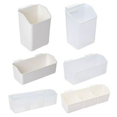 six white plastic containers with dividers on each side and one empty container in the middle