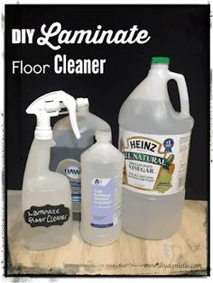 three gallon jugs of diy laminate floor cleaner