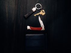 a pair of scissors and a wallet on a table