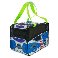 a blue and white lunch bag with green straps