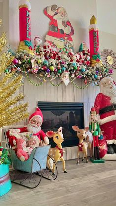 santa claus and his reindeers are sitting in front of the fireplace with christmas decorations