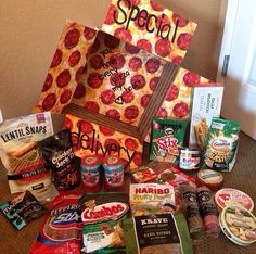 an assortment of food items are displayed on the floor