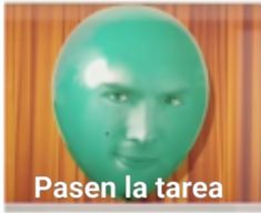 a green balloon with a man's face in the middle and words written below it