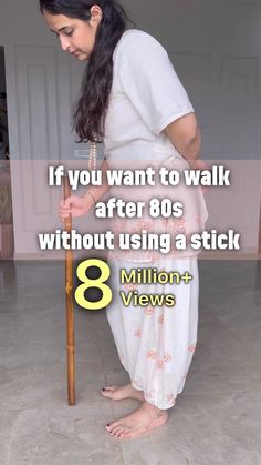 a woman standing on the floor holding a stick with text over it that reads, if you want to walk after 80's without using a stick 8 million views