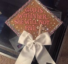 a graduation cap that says god is within her she will not fail