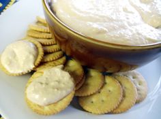 some crackers and dip on a plate