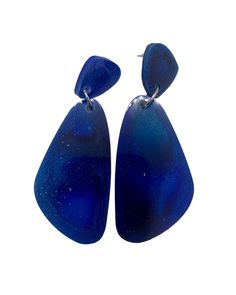 The earrings are made with epoxi resine, blue alcohol ink color and silver metal.. Add it to any outfit for the perfect touch of urban chic.  Modern urban feel.  This earrings are an ideal treat for youself or perfect as a GIFT for anyone you love.  We strive for 100% customer satisfaction. If any problems are encountered upon receipt, please notify me for a quick and friendly resolution.   Don't forget to make sure your Etsy address is correct as that is where I will ship it to.    Check out the main shop page to browse our full line: http://www.etsy.com/shop/enjoywelrydesign Trendy Blue Resin Jewelry, Artsy Blue Dangle Earrings, Blue Resin Jewelry For Party, Blue Resin Jewelry For Parties, Handmade Blue Resin Earrings, Artsy Blue Jewelry For Party, Artsy Blue Earrings For Party, Blue Resin Dangle Jewelry, Elegant Blue Resin Earrings