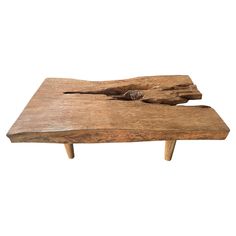 a wooden table with two pieces of wood on it