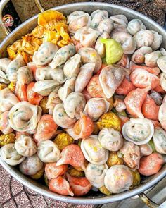 a large pot filled with lots of different types of food