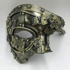 A Steampunk Half Mask on the theme of the Phantom of the Opera. In a steampunk uchrony the opera songs would be replaced by a more modern and noisy style! Item type: Steampunk mask Gender: Unisex Material: Plastic Special use: Cosplay & Steampunk costume Explore the Steampunk masks collection and choose your look: plague doctor, dieselpunk soldier, majestic Venetian, gothic nobleman or post-apo punk. Create an original costume without any limits! Help yourself with other Steampunk accessories to Punk Costume Halloween, Phantom Masquerade, Steampunk Mode, Phantom Mask, Punk Costume, Moda Steampunk, Mask Ball, Mode Steampunk, Steampunk Mask