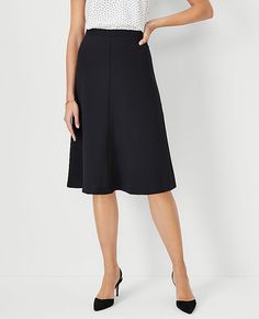 Subtly swirled with a hint of swing, this woven skirt is the perfect balance of fit and flare. Hidden back zipper with hook-and-eye closure. Lined.,Bullet3:27" long,Hit:Hits at knee,Imported:Imported,Fit:Tailored fit,Fabrication:95% Polyester, 5% Spandex,Garment Care:Machine Washable The Flare Skirt in Fluid Crepe by Ann Taylor Size regular - 00 Black Women's Suit, Skirts, Skirts, 95%, Polyester, 5%, Spandex, Machine, Washable A Line Work Skirt, Skirts For Women Over 60 Years Old, Black Womens Suit, Work Skirt Outfit, A Line Skirt Outfits, Black Skirt Suit, Ponte Skirt, Boss Woman, Work Skirt