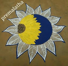 a painted sunflower with the words premalatha written in white and blue on it