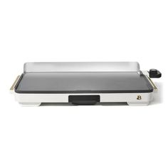 a white and black electric griddle grill on a white surface with the lid open