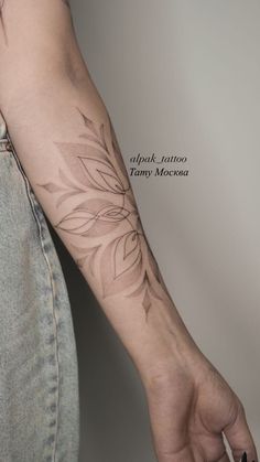 a person with a tattoo on their arm