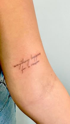 a woman's arm with a tattoo saying everything happens for a reason