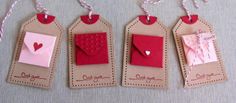 three tags with hearts attached to them