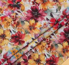 the fabric is colorful and has flowers on it