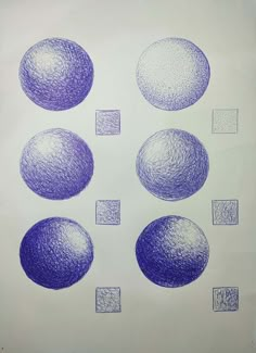 four blue balls are shown in this drawing