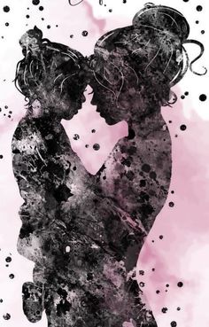 the silhouette of two people kissing in front of a pink background with black dots on it