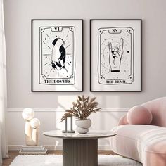 two art prints on the wall above a coffee table