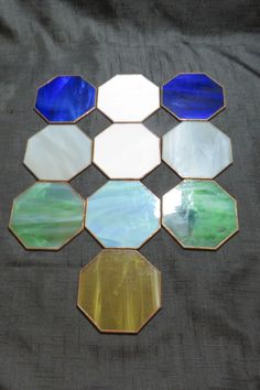 six hexagonal mirrors with different colors on them