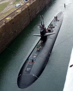 an aerial view of a submarine in the water