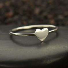 Tiny Heart Ring. This adorable and dainty heart ring is the perfect gift for you or someone special. This petite heart creates a warm and romantic look, perfect for everyday wear or special occasions. A great way to celebrate a friendship, honor your bridesmaids or say "I love you" to family. *Our "vermeil style" gold plate is 40 micro inches of 98.5% pure gold plated over sterling silver with a fine layer of nickel in between Available in Sterling Silver, Silver/Bronze and 24K Gold Plated Avail Silver Heart Ring, Pendant Bails, Silver Bead Bracelet, Monogram Jewelry, Bronze Pendant, Love Charms, Tiny Heart, Ring Black, Bead Charm Bracelet