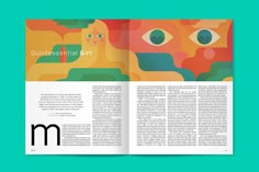 an open magazine with colorful shapes on it