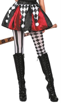 a woman dressed as a clown holding a baseball bat and wearing black and white tights