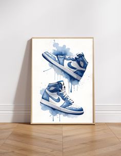 a blue and white nike sneaker poster on the wall