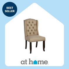 the chair is upholstered with buttons on it's back and legs, along with the best seller logo