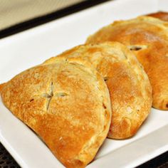 three pieces of bread on a white plate