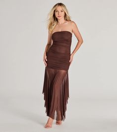 Sheer and perfect, this strapless maxi mesh dress offers a sheer asymmetric shark hem and a flowy silhouette. Pair with stilettos.Fit & FeaturesSheer mesh fabric with mini-length knit lining, plenty of stretchStrapless elasticized straight necklineRuched side seams, curve-hugging bodiceMaxi-length asymmetric shark hemFlowy silhouetteRuns true to size Orange Homecoming Dresses, Dress Satin Bridesmaid, Purple Homecoming Dress, Backless Dress Short, Green Homecoming Dresses, Lace Dress Styles, White Homecoming Dresses, Homecoming Outfits, Red Homecoming Dresses