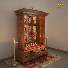 a wooden cabinet with pictures on it and candles in the corner, sitting on a rug