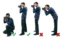 a man taking pictures with his camera and another person kneeling down in front of him