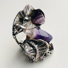 Vintage One Of A Kind Unique Brutalist Ring In Cast Sterling Silver, Tested With A Polished Amethyst Stone In Lovely Purple Violet & Lavender Coloring Swirls Silversmith Made, Eye Catching Piece One Of A Kind Brutalist Style With Its Raw Look. Pair This With Other Mod Jewelry For A Retro Feel This Ring Has Patina, Rubbing, Possible Bending From Use And Storage. Irregularities Due To Its Handmade Design Please Refer To Photos For Condition And Description Brutalist Ring, Mod Jewelry, Chunky Silver Rings, Purple Violet, Amethyst Stone, Amethyst Ring, Handmade Design, Bending, Vintage Sterling Silver