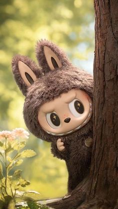 a stuffed animal is peeking out from behind a tree