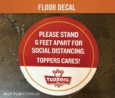 a sign that says floor decal please stand 6 feet apart for social distancing toppers cares