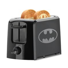 a batman toaster with two pieces of bread in it