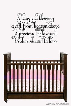 a baby is blessing wall decal in pink and black