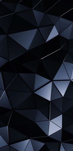 an abstract black background consisting of triangular shapes