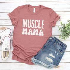 Looking for the perfect for the Muscle Mommy in your life? Look no further than our Muscle Mommy shirt. A great gift for moms who train or live that gym life. If your Mom is a lifter, get her this shirt, if you're a mom who lifts, let everyone know! Pair it with our I love my Muscle Mama shirt: https://www.etsy.com/au/listing/1433153872 - Side seams for better shape in the long run - Shoulder tape prevents stretching - Heathers and Black shirts are 52% cotton, 48% polyester - Solid colours are 100% cotton - Athletic and Black Heathers are 90% cotton, 10% polyester - Light fabric (4.2oz) - Retail fit - Water based, bio degradable, non-toxic inks, look good and feel good about it We use lifestyle images on our posts, and sometimes will need to change suppliers to make sure you get your items Muscle Mommy, Mommy Shirt, Lifestyle Images, Black Shirts, Mommy Shirts, Great Gifts For Mom, Mama Shirt