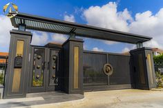 an entrance to a building with two gates