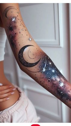 a woman's arm with stars and moon tattoos on it