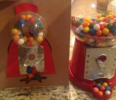 there is a candy machine and a card on the counter