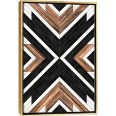 a black and white geometric design with wooden accents serving tray