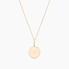 DISCOUNTS DO NOT APPLY This sleek beauty was designed for the luxe minimalist. Made in 14k solid gold with a lab grown center diamond, this piece is a forever favorite and heirloom piece meant to be cherished for many generations. 14k solid gold coin with center diamond charm on 18" 14k gold cable chain. Diamond Circle Necklace, Bracelets With Meaning, Zodiac Pendant, Gold Coin, Diamond Charm, Silver Shop, Charm Set, Coin Necklace, Full Circle