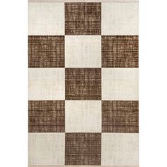 a brown and white rug with squares on the bottom, in different shades of brown