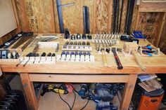 a workbench with many tools on it